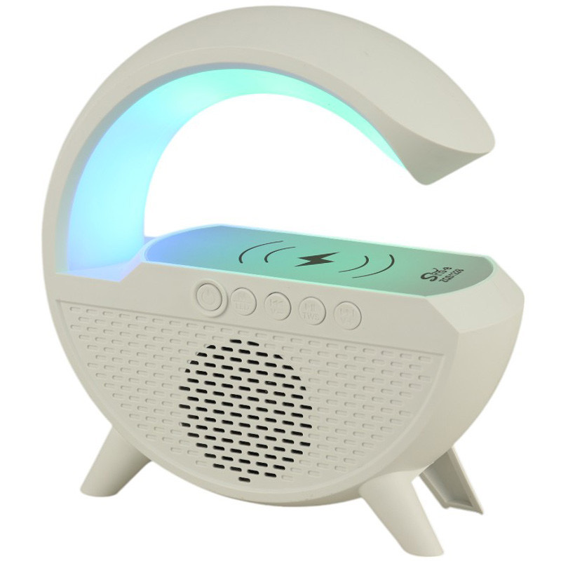 اسپیکر بلوتوثی zqs-1228 با نور خواب روشن روی میز چوبی