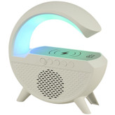 اسپیکر بلوتوثی zqs-1228 با نور خواب روشن روی میز چوبی